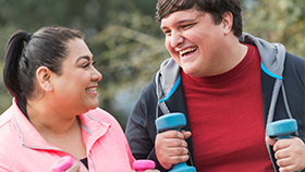 Two people exercising.